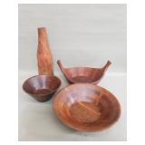Three wood bowls and vase