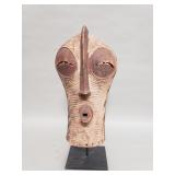 Vintage African carved wood mask on iron stand