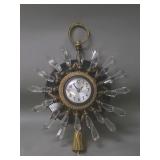 Vintage electric sunburst gilt brass wall clock