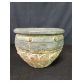 Terracotta planter depicting fish motif
