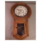 Vintage regulator wall clock with key