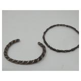 Pair of silver bracelets