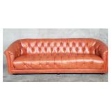 Chesterfield-style leather tufted sofa