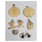 Group of pendants, pin, and earrings