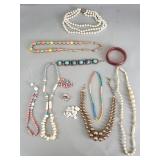 Costume jewelry necklaces, bracelet, etc.