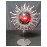 Metal and glass sunburst candleholder