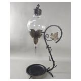 Vintage etched-glass wine aerator dispenser on a