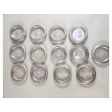 Group of 13 silver plate and crystal coasters
