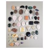 Group of jadeite, onyx, and other stones