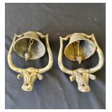 Pair of vintage cast iron dinner bells