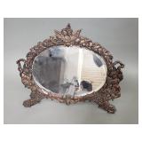 Victorian style cast iron Cherub motif mirror