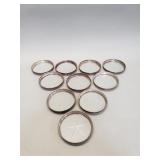 Ten sterling silver and glass coasters
