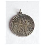 Silver coin pendant