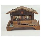 Vintage Cuendet Swiss chalet-form wooden music box