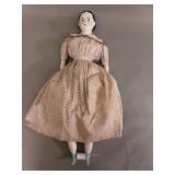 Antique porcelain and fabric doll