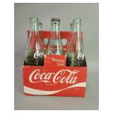 Vintage six pack Coca-Cola bottles