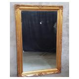 Large French-style gilt wood beveled mirror