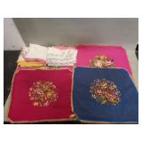 Group of vintage needlepoint panels and placemats