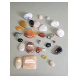 Group of polished stones, morganite, quartz,