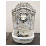 Cast stone lion head wall fountain