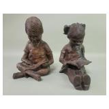 Red Mill Mfg. Pecan shell and resin boy and girl
