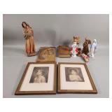 Group of religious figurines, Bible, and