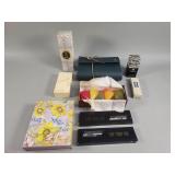 Group of perfumes, cologne, LCD time pens, etc