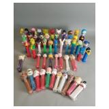 Group of Pez candy dispensers, Disney, Peanuts,