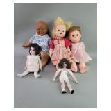 Group of vintage rubber and porcelain dolls