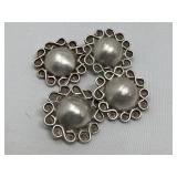 Group of four silver jewelry clips