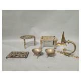 Brass salt cellars, trivets, wall hook,  ship