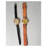 Pair of vintage gold plated windup wristwatch