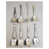 Group of sterling silver spoons and fork