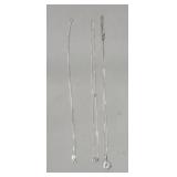 Three sterling silver chains one with rhinestone