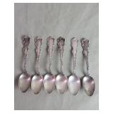 Six sterling silver spoons