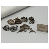 Group of eight sterling and silver earrings and