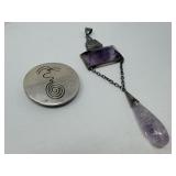 Pair of sterling silver pendants