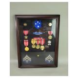 Group of military medals, ribbons and insignia