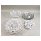 Group of glass and crystal bowls, plates, and