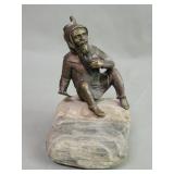 Vintage brass "Wroclaw Dwarf" figure on rock