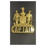 Vintage brass captain badge