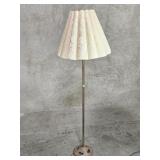 Vintage Art Deco-style brass and metal floor lamp