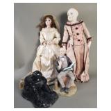 Group of porcelain dolls and figurines
