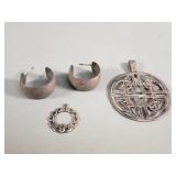 Pair of sterling silver pendants, and earrings