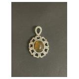 Vintage sterling silver pendant with oval brown