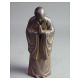 Cast iron Buddhist monk figure
