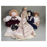 Group of porcelain wax, and fabric dolls