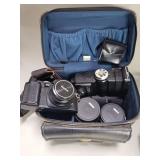 Konica FS-1 film camera with accessories