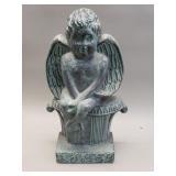 Vintage cast iron cherub doorstop