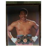 Print of photograph, signed by George Foreman